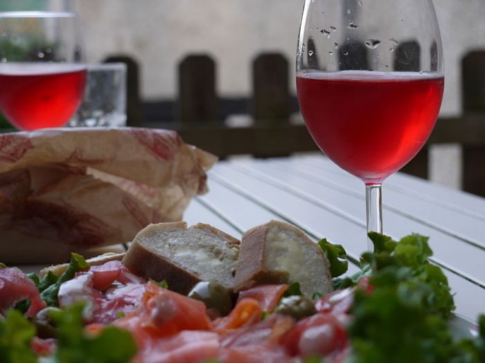 Lunch and a glass of Rose by Tristan Ferne